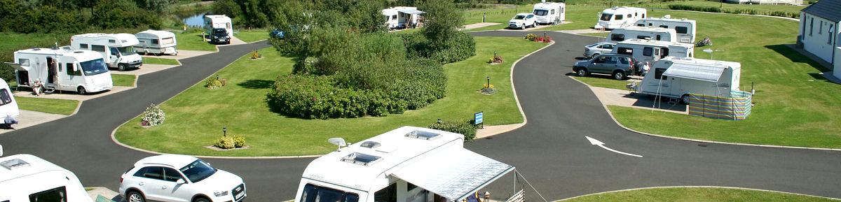 Holiday park and camping site grass cutting and tree surgery by Just a Mow, Pembrokeshire